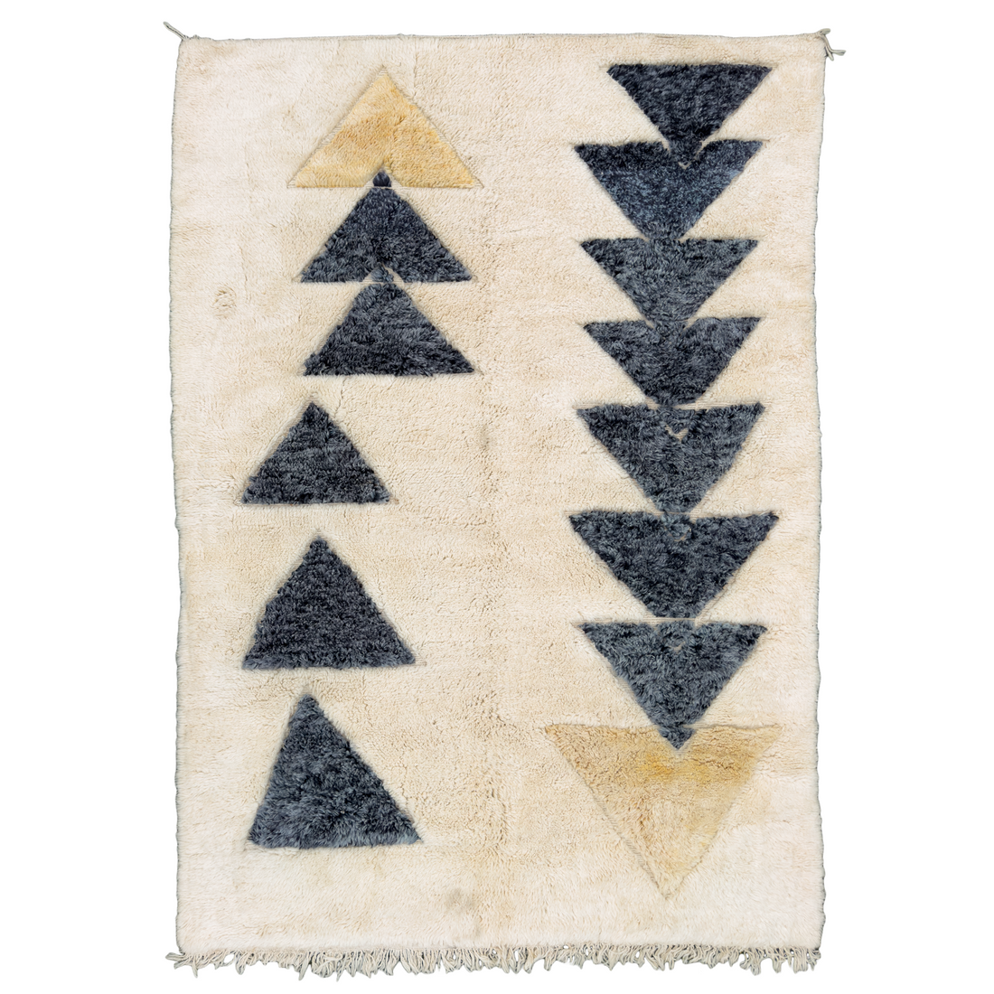Elevate your home decor with the Misdirection Moroccan Wool Rug. Handcrafted with plush wool and featuring captivating black triangle motifs on a yellow and cream background, this luxurious rug adds a touch of sophistication to any space. Perfect for modern and bohemian interiors. Available in a generous size of 7&